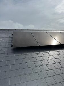 All black solar panels installed on customer's roof.