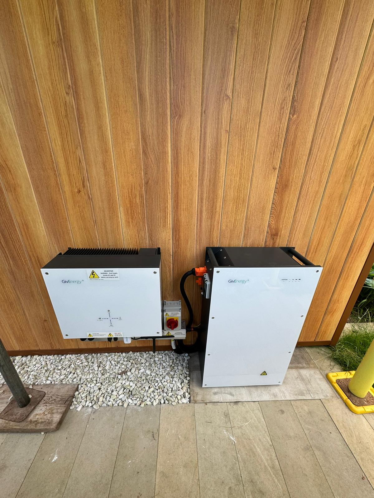 GivEnergy inverter and battery installed side by side.