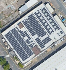100 kWp system demonstrating commercial solar ROI 2026 UK on industrial roof